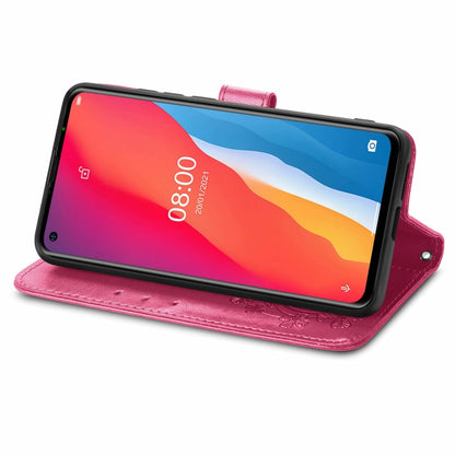 Magenta embossed leather flip phone case with stand, card holder and wrist lanyard