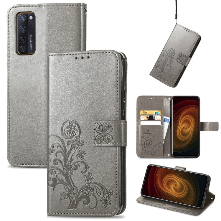 Gray embossed leather wallet phone case with clasp, lanyard, and card slots