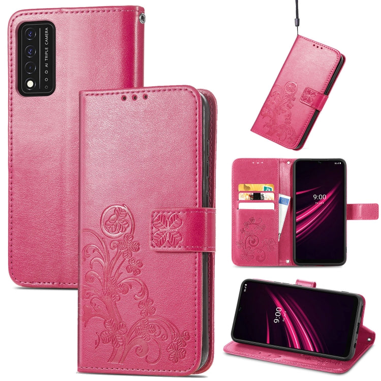 Pink embossed leather wallet phone case with lanyard, card slot, and stand support.