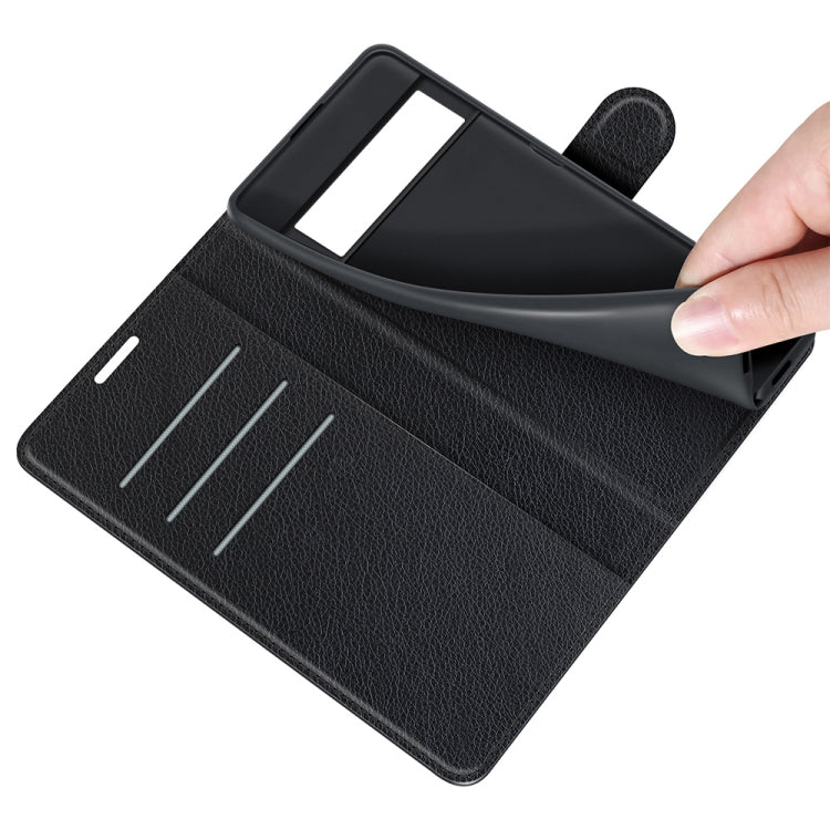 Black wallet flip case for Pixel 6 Pro showing interior card slots and back cover