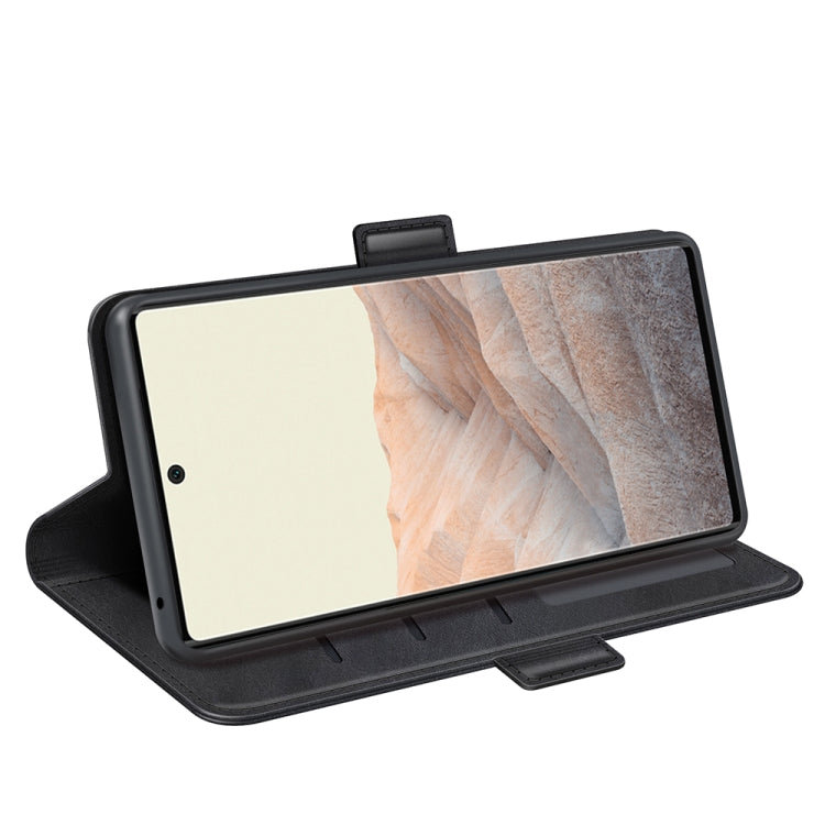 Black leather flip phone case folded as a stand for landscape viewing