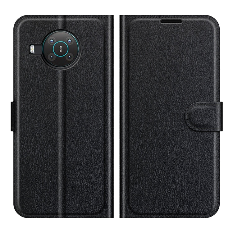 Black litchi flip wallet phone case with magnetic strap and card slot pocket