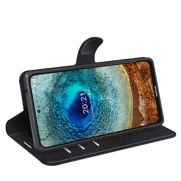 Black flip stand wallet case with holder for Nokia phone