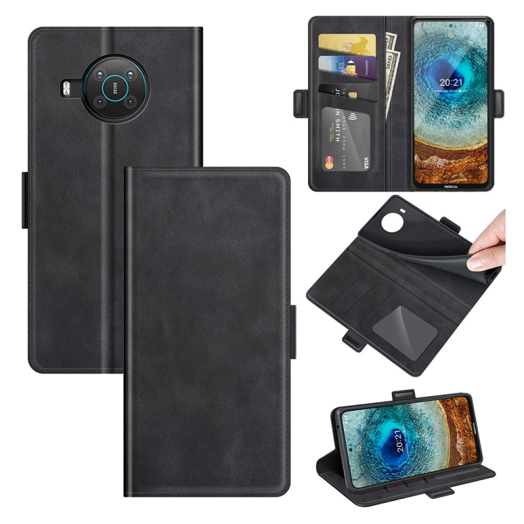 Black flip leather phone case with magnetic buckle, card slots, and wallet holder