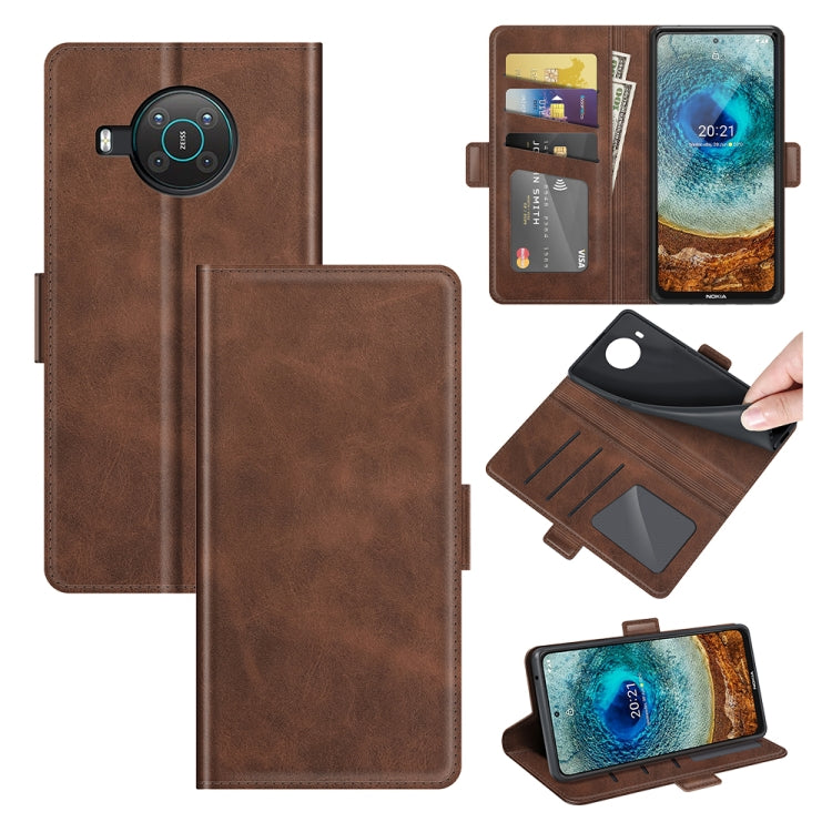 Brown wallet flip phone case open with card slots and magnetic clasp