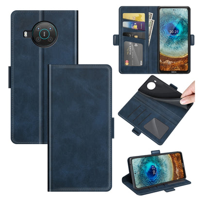 Dark blue flip leather phone case with magnetic buckle, card slots, and wallet holder