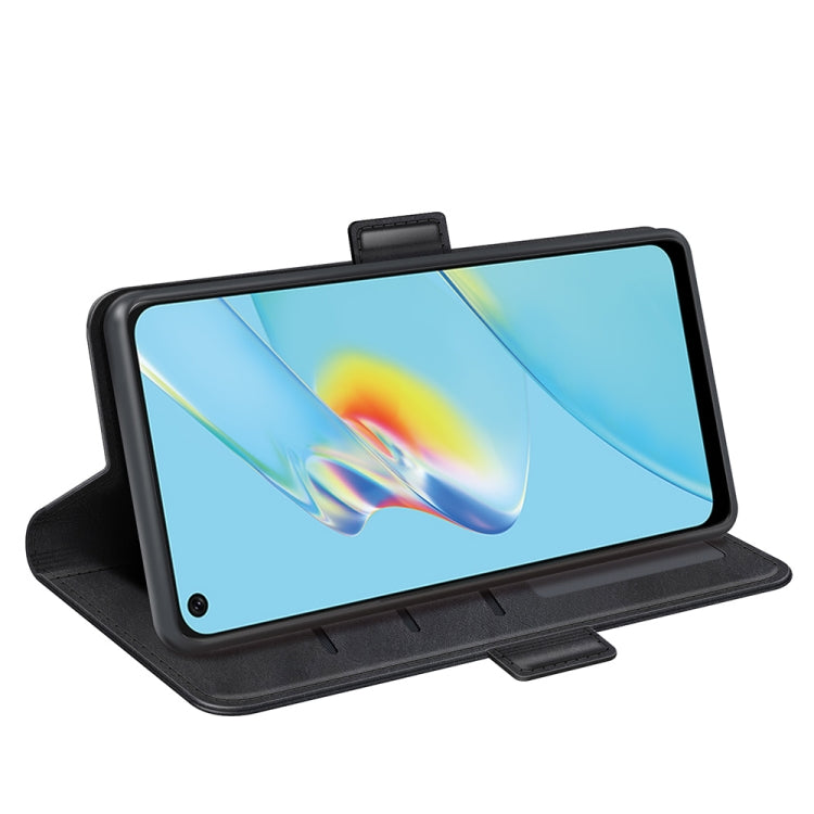 Black leather flip phone case with stand support, holding phone in landscape