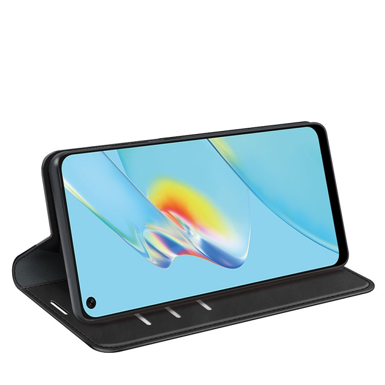 Black leather wallet phone case with kickstand, magnetic closure, and card slots