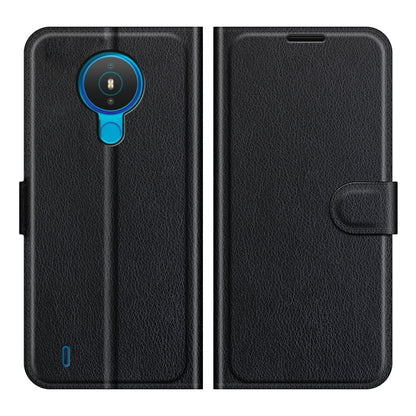 Black textured flip phone case with magnetic closure and cutouts for Nokia 1.4