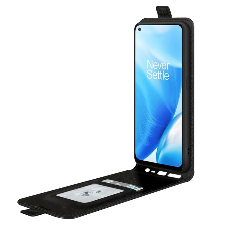 Black wallet-style flip case with card slot and photo frame, phone shown
