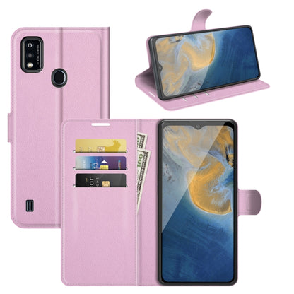 Pink litchi flip phone case with card slots, stand, and holder