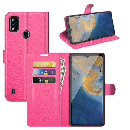 Fuchsia litchi flip phone case with card slots and built-in stand