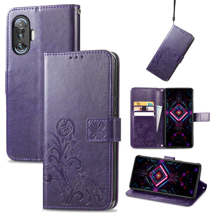 Purple leather wallet phone case with embossed four-leaf clasp, card slots, lanyard