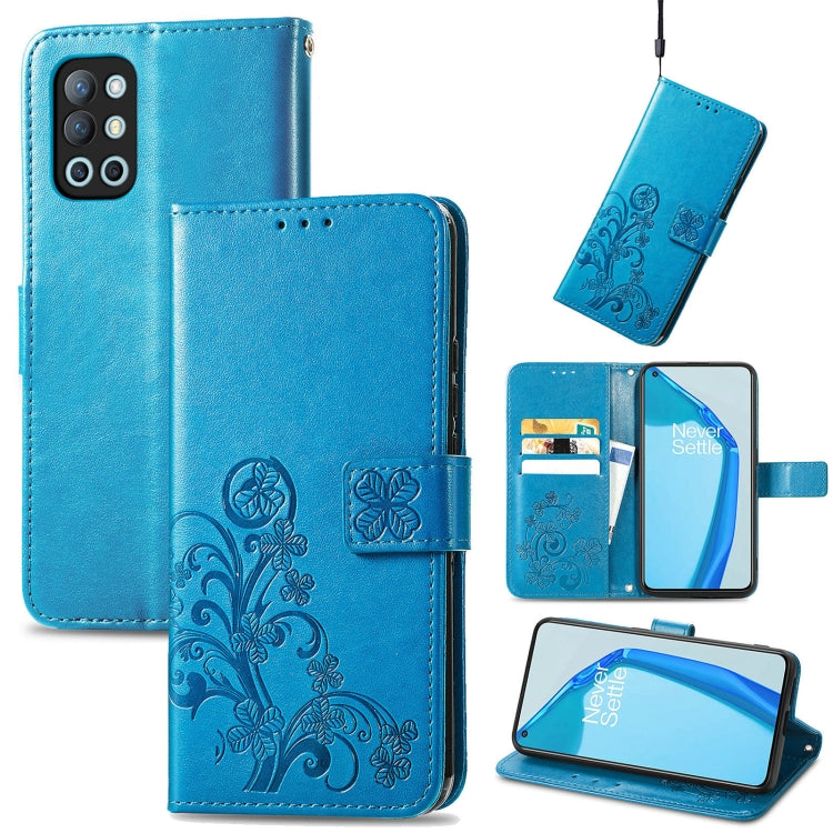 Blue leather phone case with embossed floral clasp, card slots, and lanyard
