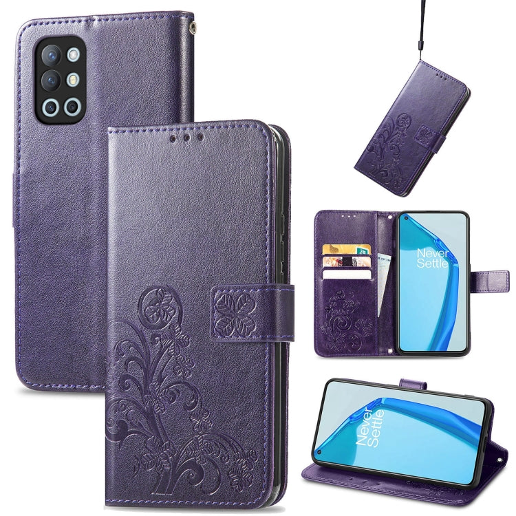 Purple leather phone case with embossed floral clasp, card slots, and lanyard
