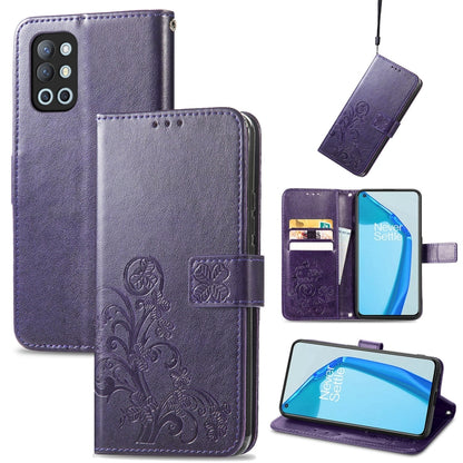 Purple leather phone case with embossed floral clasp, card slots, and lanyard