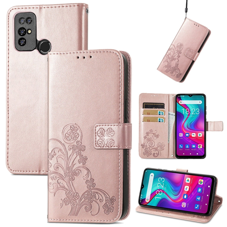 Light pink leather phone case with embossed floral clasp, card slots, and lanyard