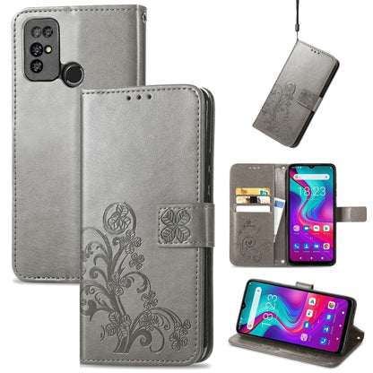 Gray leather phone case with embossed floral clasp, card slots, and kickstand
