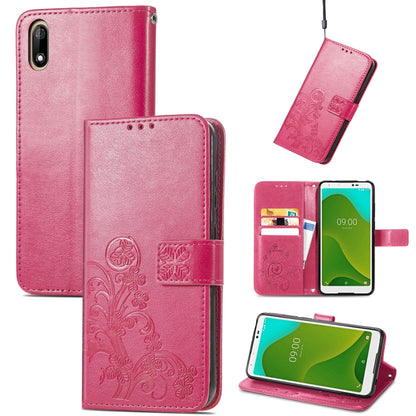 Pink leather phone case with embossed floral clasp, card slots, and kickstand