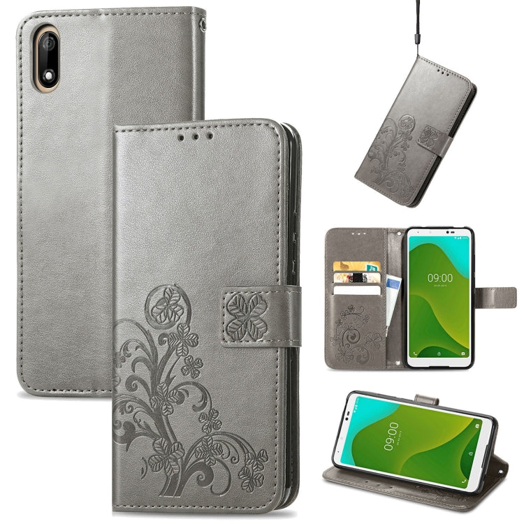 Gray leather wallet phone case with embossed floral, card slots, and lanyard strap