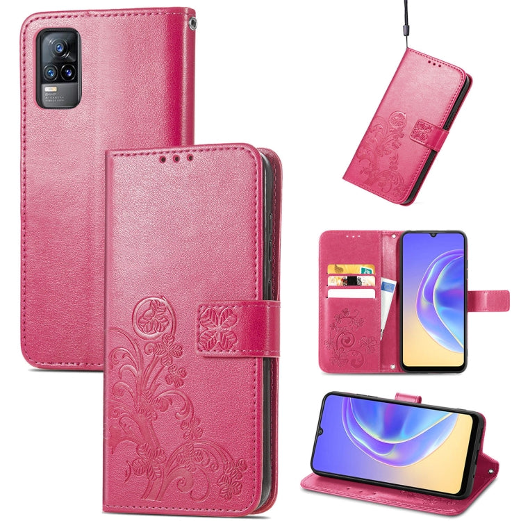 Pink leather wallet phone case with embossed floral, card slots, and lanyard strap