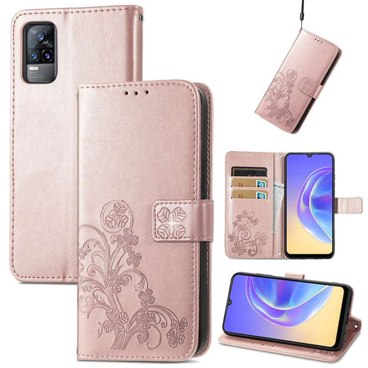 Light pink leather wallet phone case with embossed floral, card slots, and lanyard strap