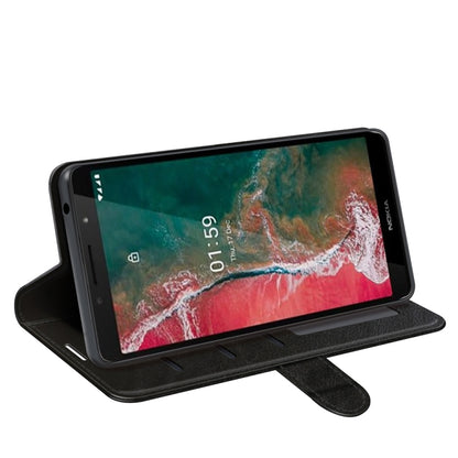 Black leather-style flip case with fold-out stand supporting phone in landscape view