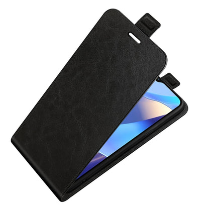 Black leather flip phone case angled view with camera cutout and foldover flap.