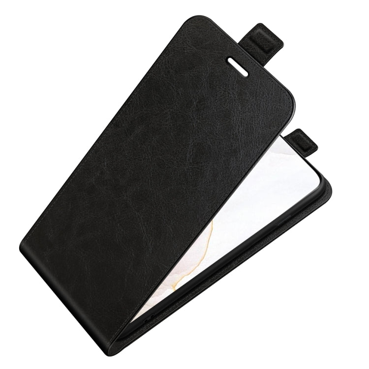 Black vertical flip leather case with folio cover, angled open to show phone screen.