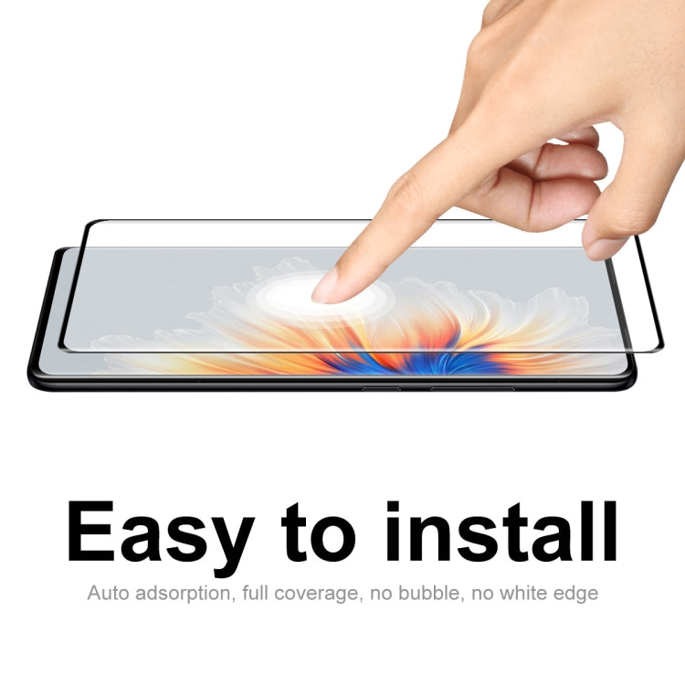 Tempered glass screen protector for Xiaomi Mix 4 being applied, full coverage