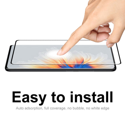 Tempered glass screen protector for Xiaomi Mix 4 being applied, full coverage