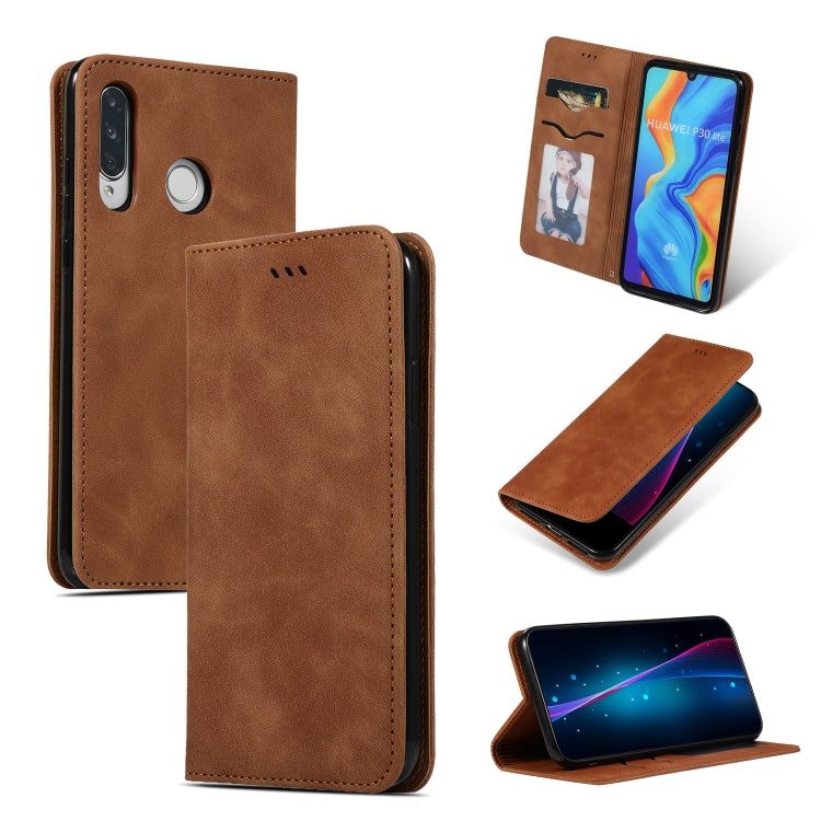 Brown leather flip phone case with magnetic closure and camera cutout