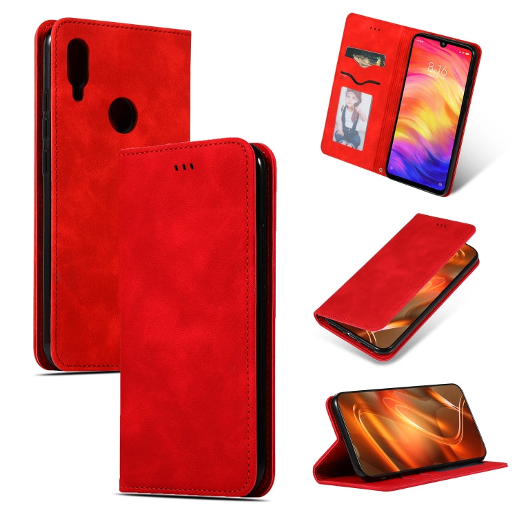 Red leather wallet-style flip phone case with magnetic closure and internal card slot
