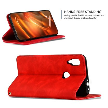 Red leather flip phone case with stand position and camera cutout on back