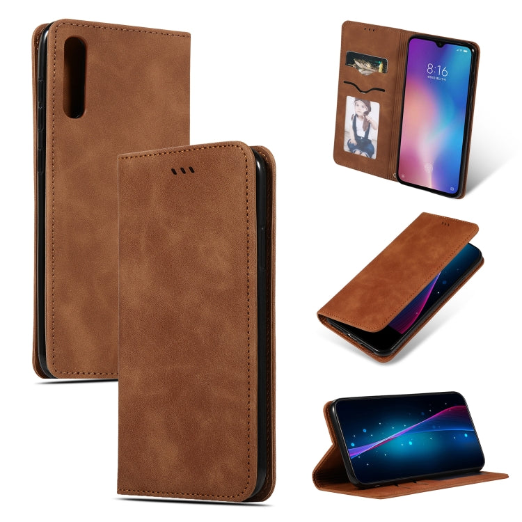 Brown leather wallet flip phone case with magnetic closure and card slot