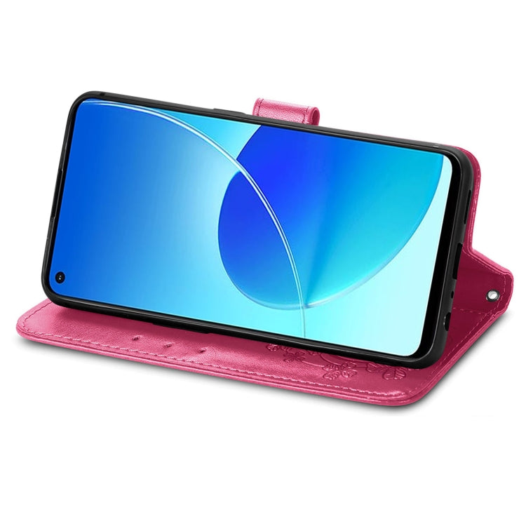 Magenta leather folio phone case with embossed floral pattern, stand viewing