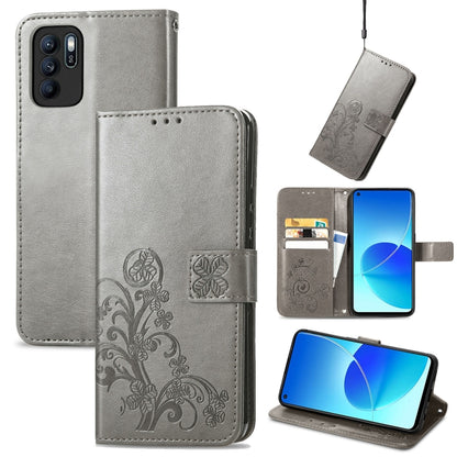 Grey leather wallet phone case with embossed floral clasp, card slot, lanyard strap