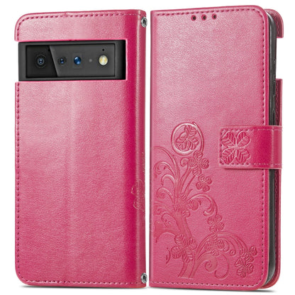 Magenta embossed leather wallet phone case with card holder and four-leaf clasp detail