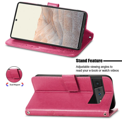 Magenta folio leather phone case with stand and card slot, four-leaf clasp embossing