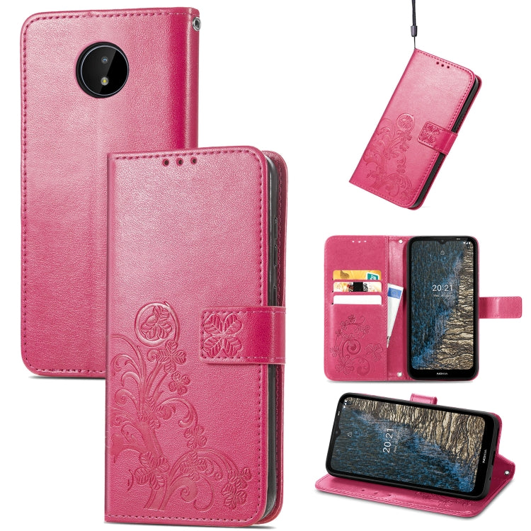 Magenta leather wallet phone case with embossed floral pattern, card slots, lanyard, stand