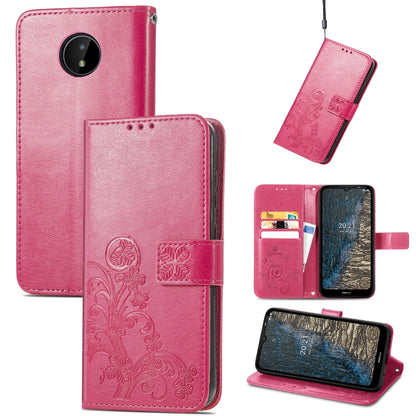 Magenta leather wallet phone case with embossed floral pattern, card slots, lanyard, stand