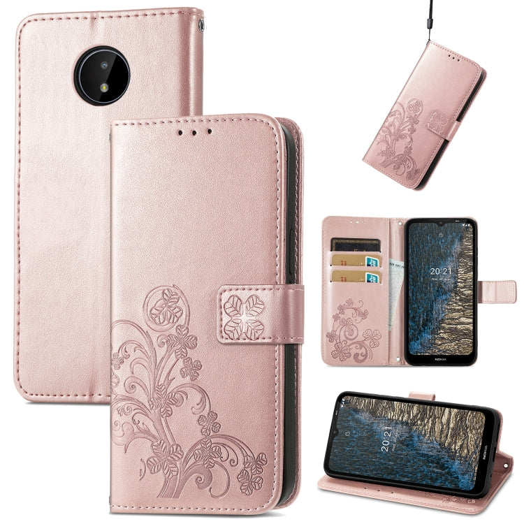 Rose pink leather wallet phone case with embossed floral pattern, card slots, lanyard, stand