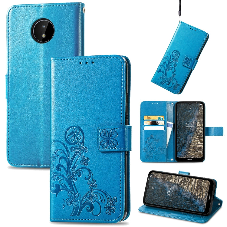 Blue leather wallet phone case with embossed floral pattern, card slots, lanyard, stand