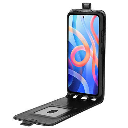 Black leather flip phone case open, card slot and photo window visible