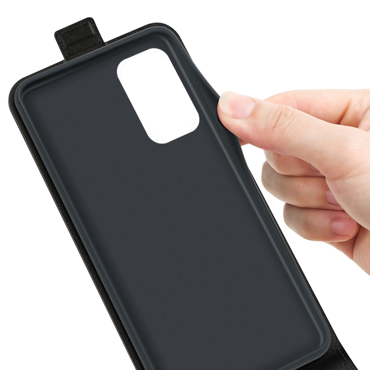 Black leather phone case back with camera cutout, held by hand
