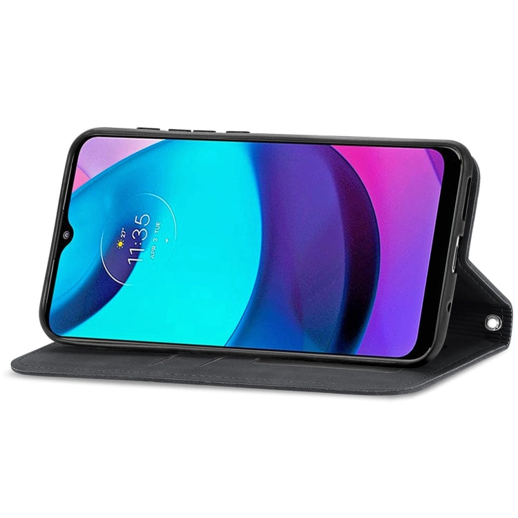 Dark leather flip phone case folded to stand in landscape viewing position