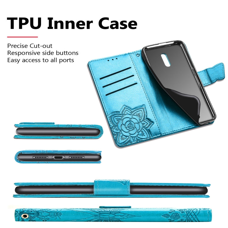 Blue TPU inner phone case with floral emboss and side cutouts for ports