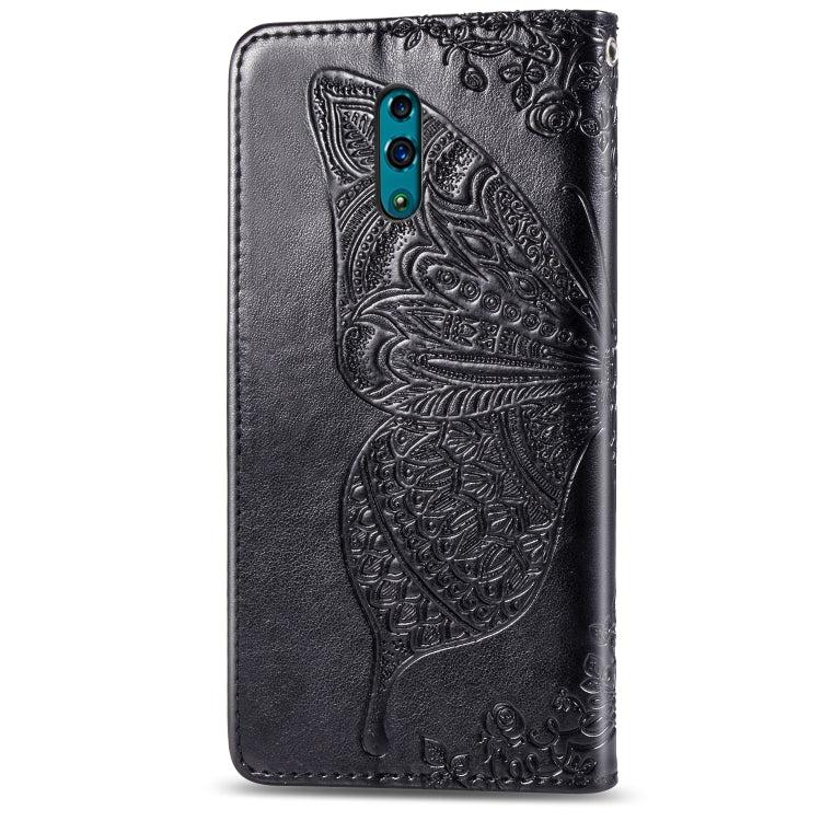 Black embossed flip leather phone case with butterfly motif and teal camera cutouts.