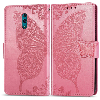 Pink embossed flip phone wallet case with butterfly and floral pattern
