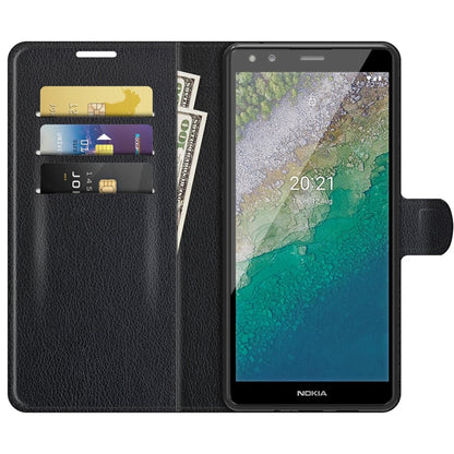 Black flip wallet phone case open, showing card slots and phone in protective holder.